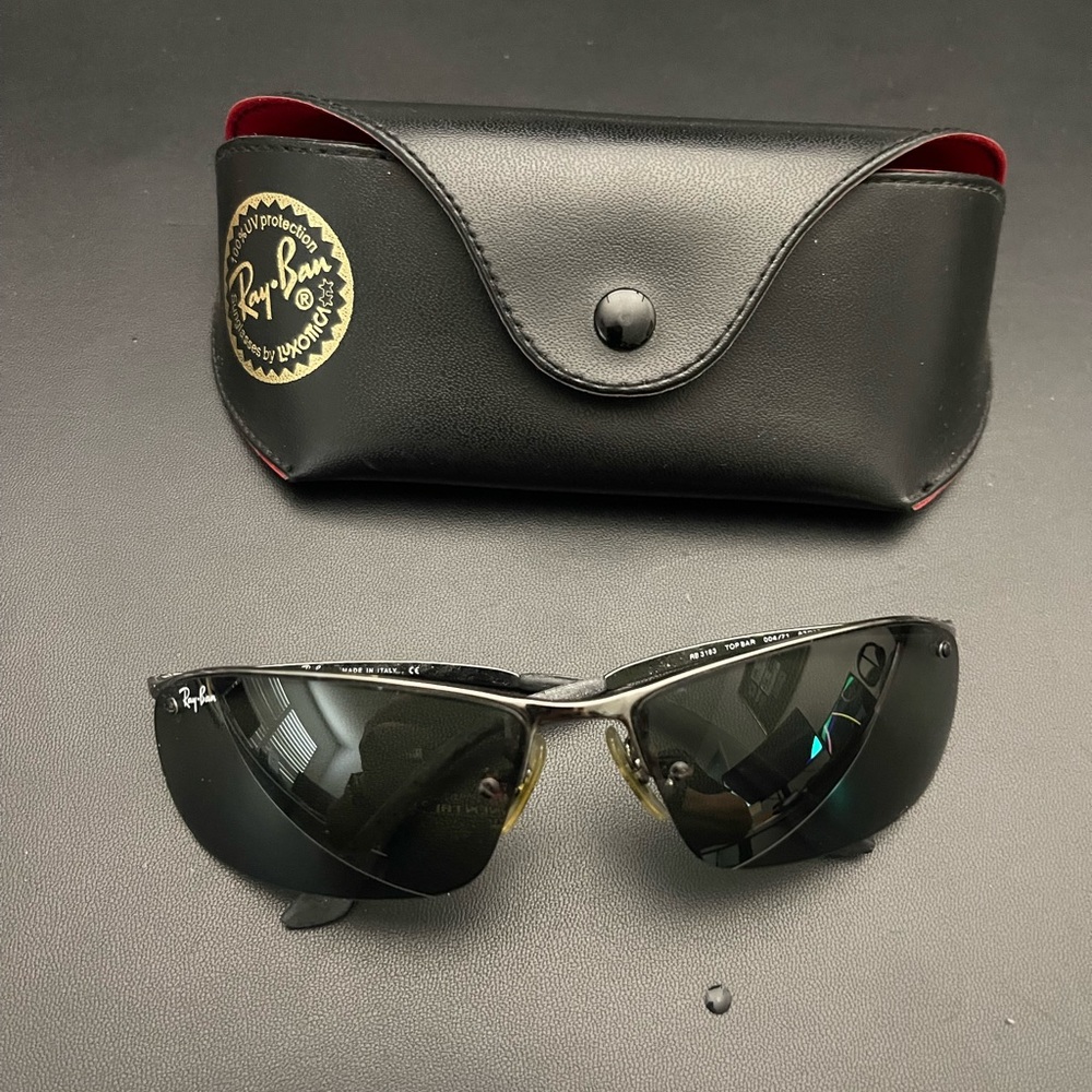 Ray Ban wrap around sunglasses.